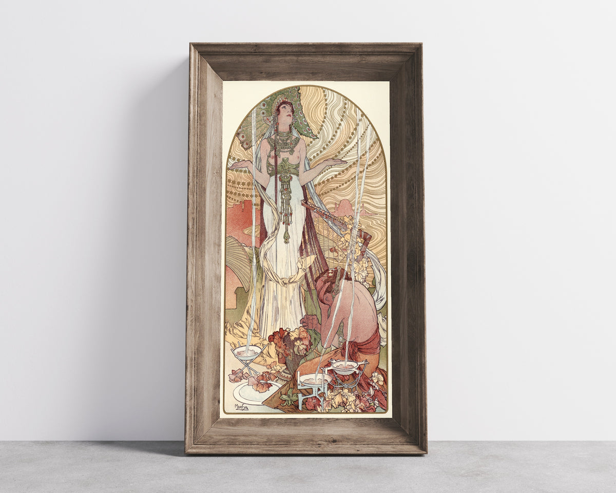 Framed art print of Incantation (Salammbô) by Alphonse Mucha, in a wide wooden frame leaning against a concrete wall