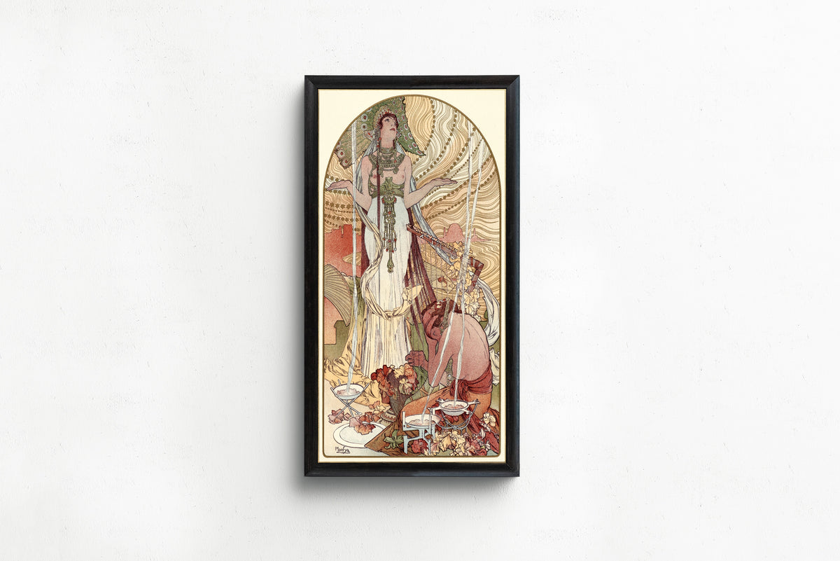 Framed art print of Incantation (Salammbô) by Alphonse Mucha, in a slim black frame on a plain white wall