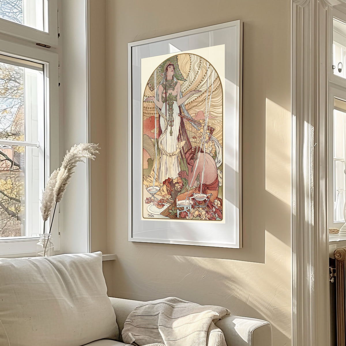 Framed art print of Incantation (Salammbô) by Alphonse Mucha, in a sunlit living room above a sofa