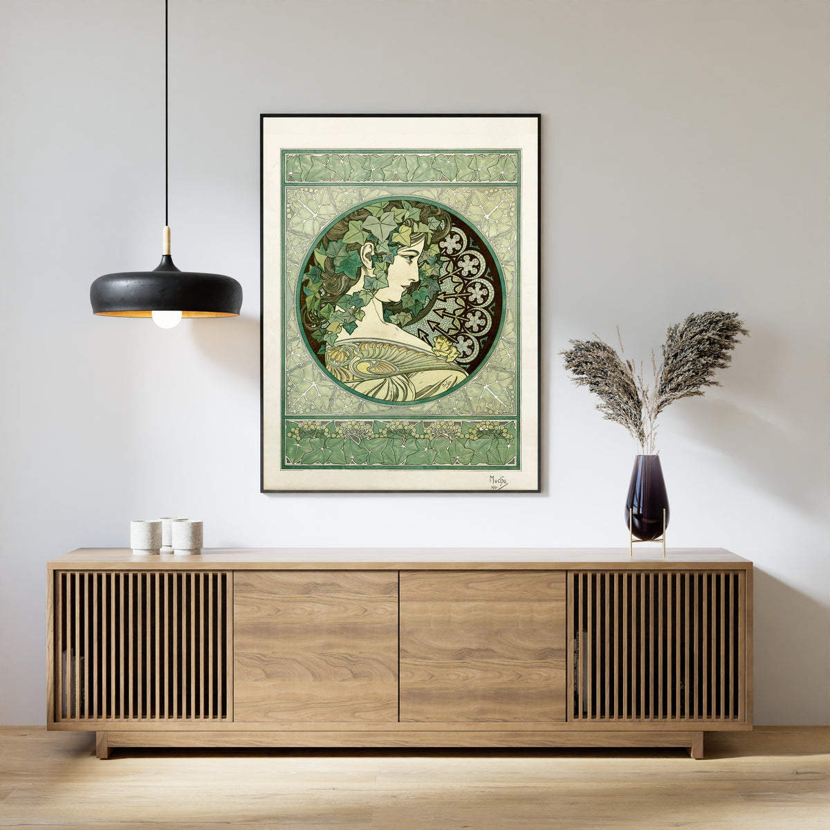 Framed art print of Ivy by Alphonse Mucha, above a slatted wood sideboard