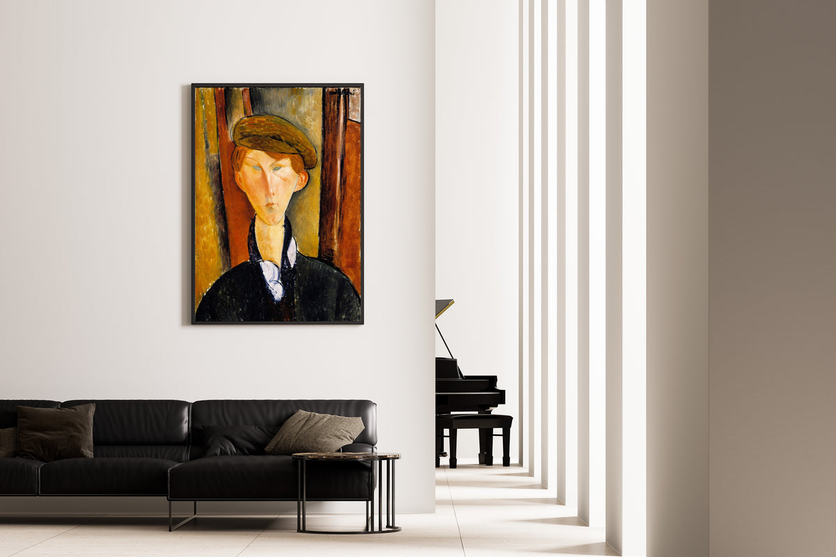 Young Man with a Cap by Amedeo Modigliani — framed on the wall of a minimal living room