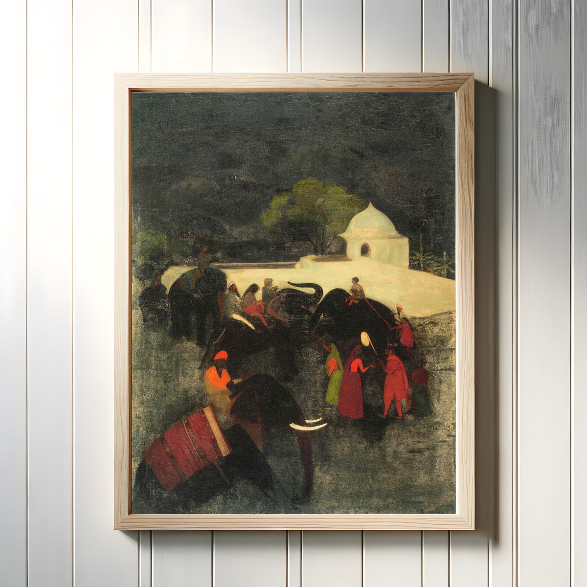 Framed art print of Elephant Promenade (1940) by Amrita Sher-Gil, in a light wood frame on a white panelled wall
