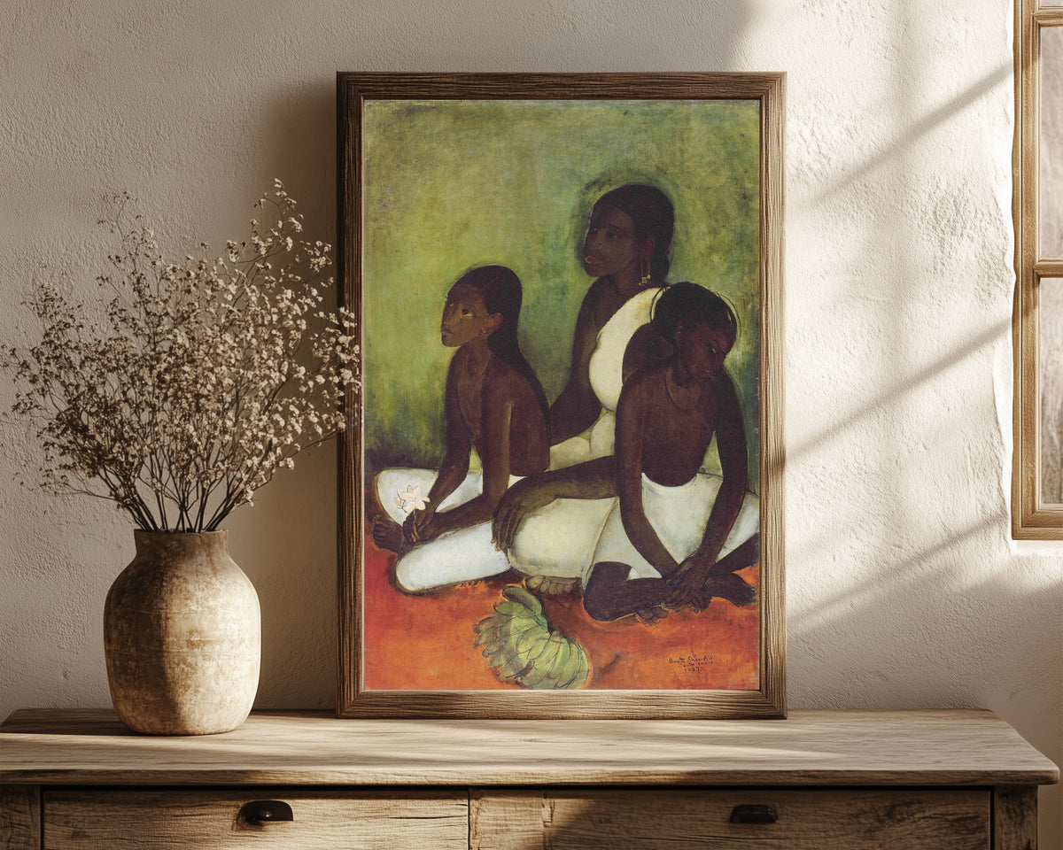 Framed art print of Fruit Vendors (1937) by Amrita Sher-Gil, in a dark wood frame leaning on a rustic console beside dried flowers