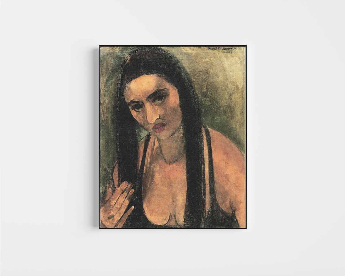 Framed art print of Self-Portrait with Long Hair (1934) by Amrita Sher-Gil, in a slim black frame on a plain white wall
