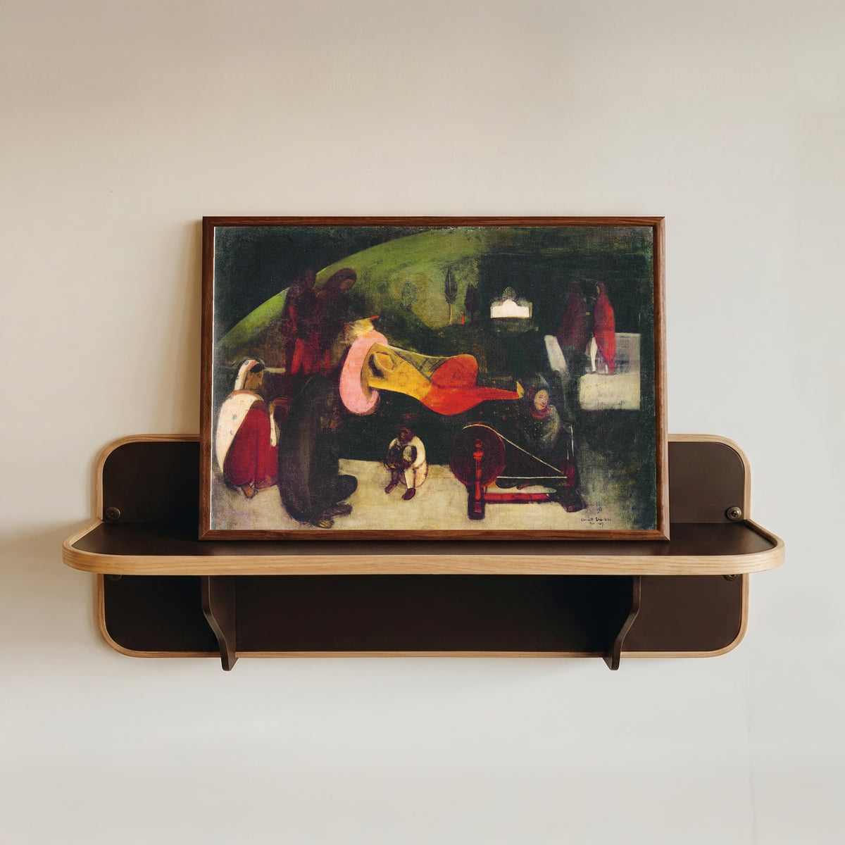 Framed art print of Siesta (1937) by Amrita Sher-Gil, in a dark wood frame resting on a wall shelf