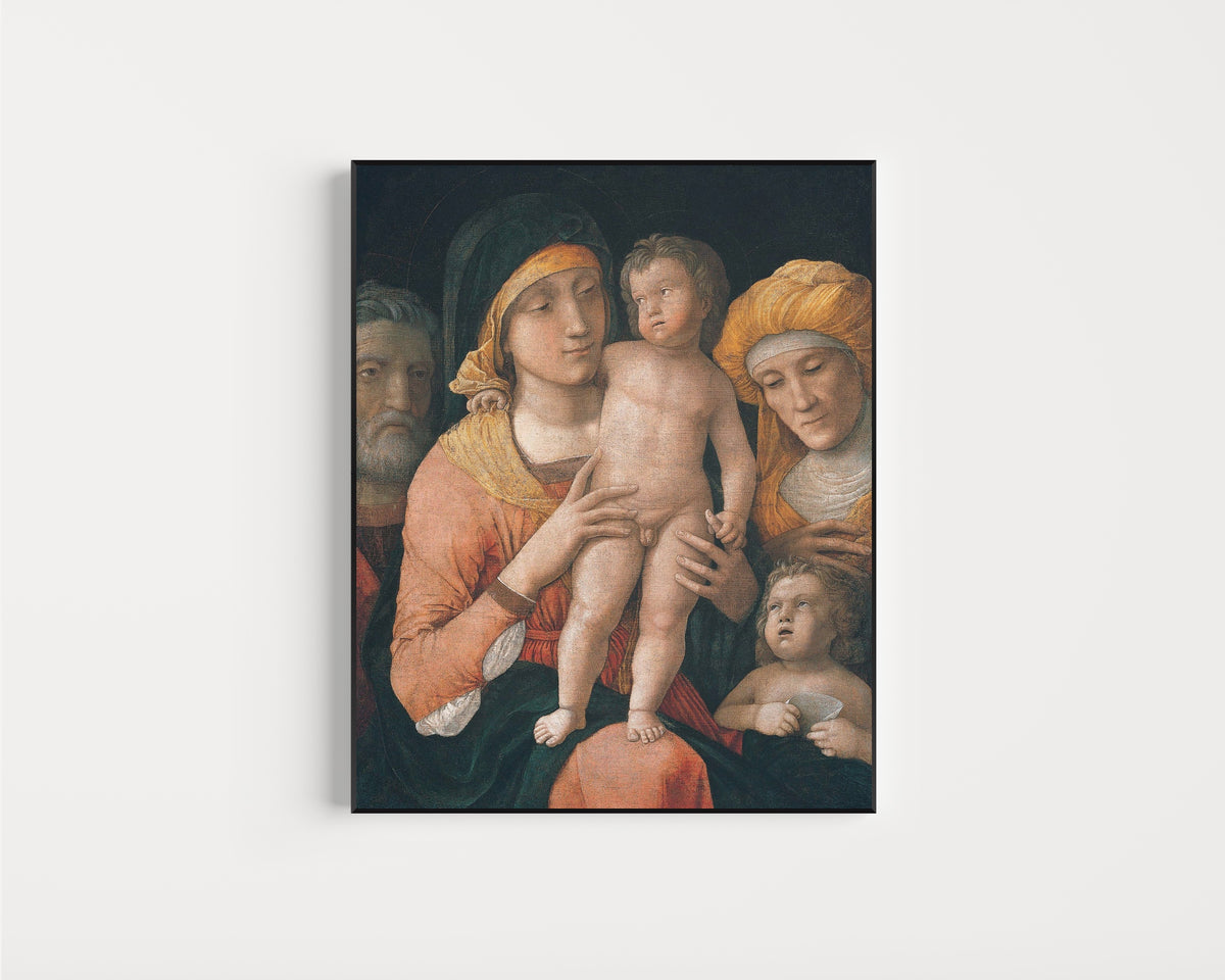 Framed art print of The Madonna and Child with Saints Joseph, Elizabeth, And John the Baptist by Andrea Mantegna, in a slim black frame on a plain white wall
