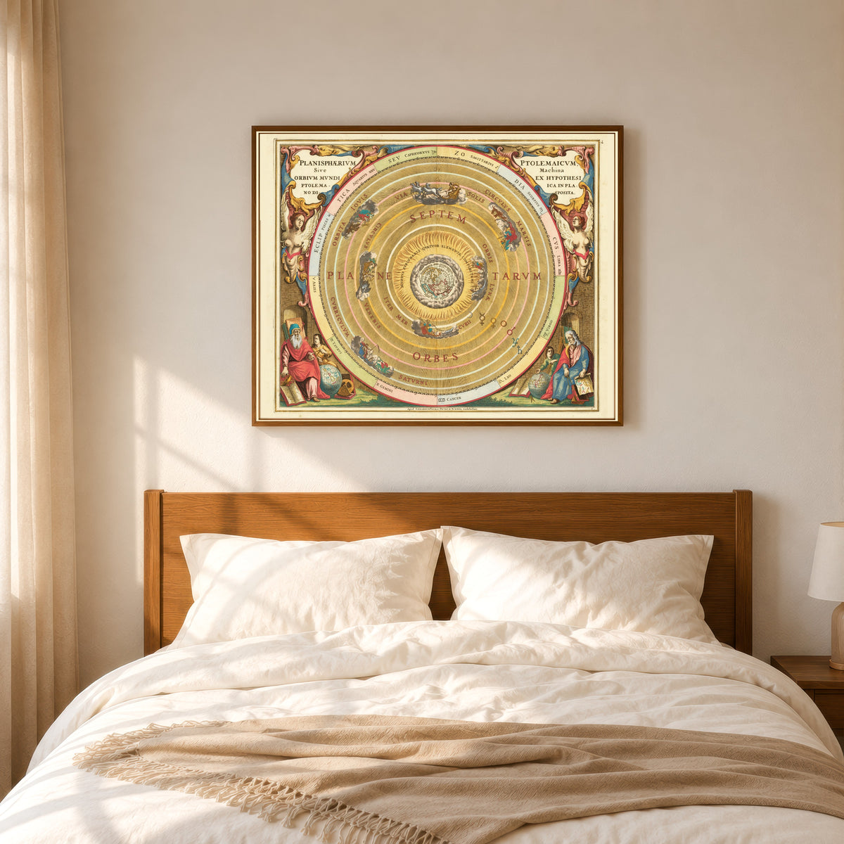 Framed art print of The Ptolemaic Planisphere (Plate 1) by Andreas Cellarius, in a slim wood frame above a bed in a sunlit bedroom