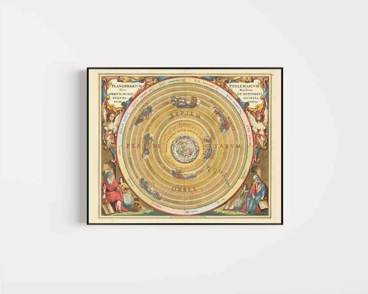 Framed art print of The Ptolemaic Planisphere (Plate 1) by Andreas Cellarius, in a slim black frame on a plain white wall