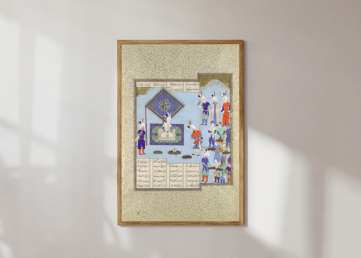 Framed art print of Shahnama of Shah Tahmasp: Kai Khusrau's War Prizes Are Pledged by Aqa Mirak (attributed), in a light wood frame on a sunlit white wall