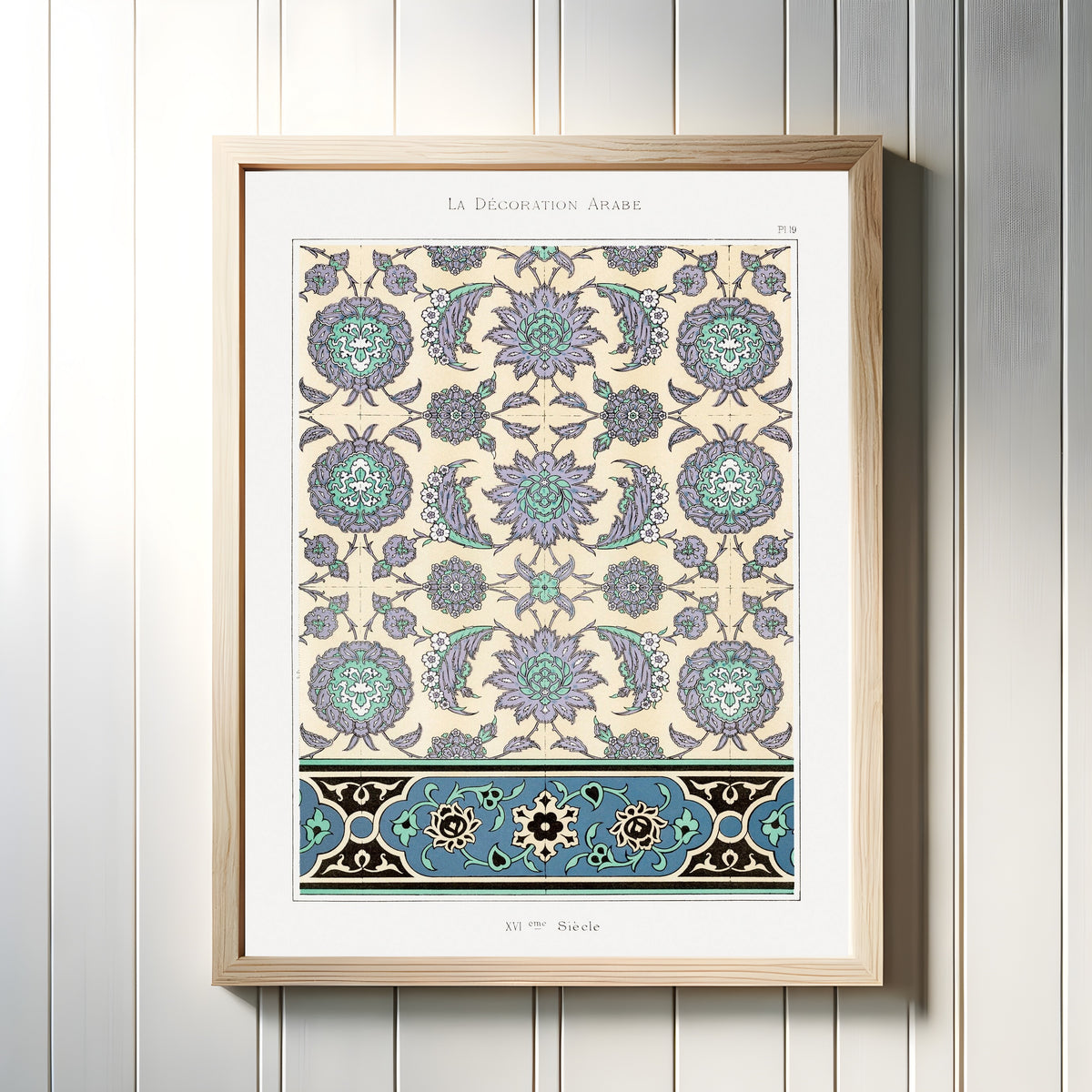 Framed art print of Arabian Pattern 19 by Prisse d'Avennes, in a light wood frame on a white panelled wall