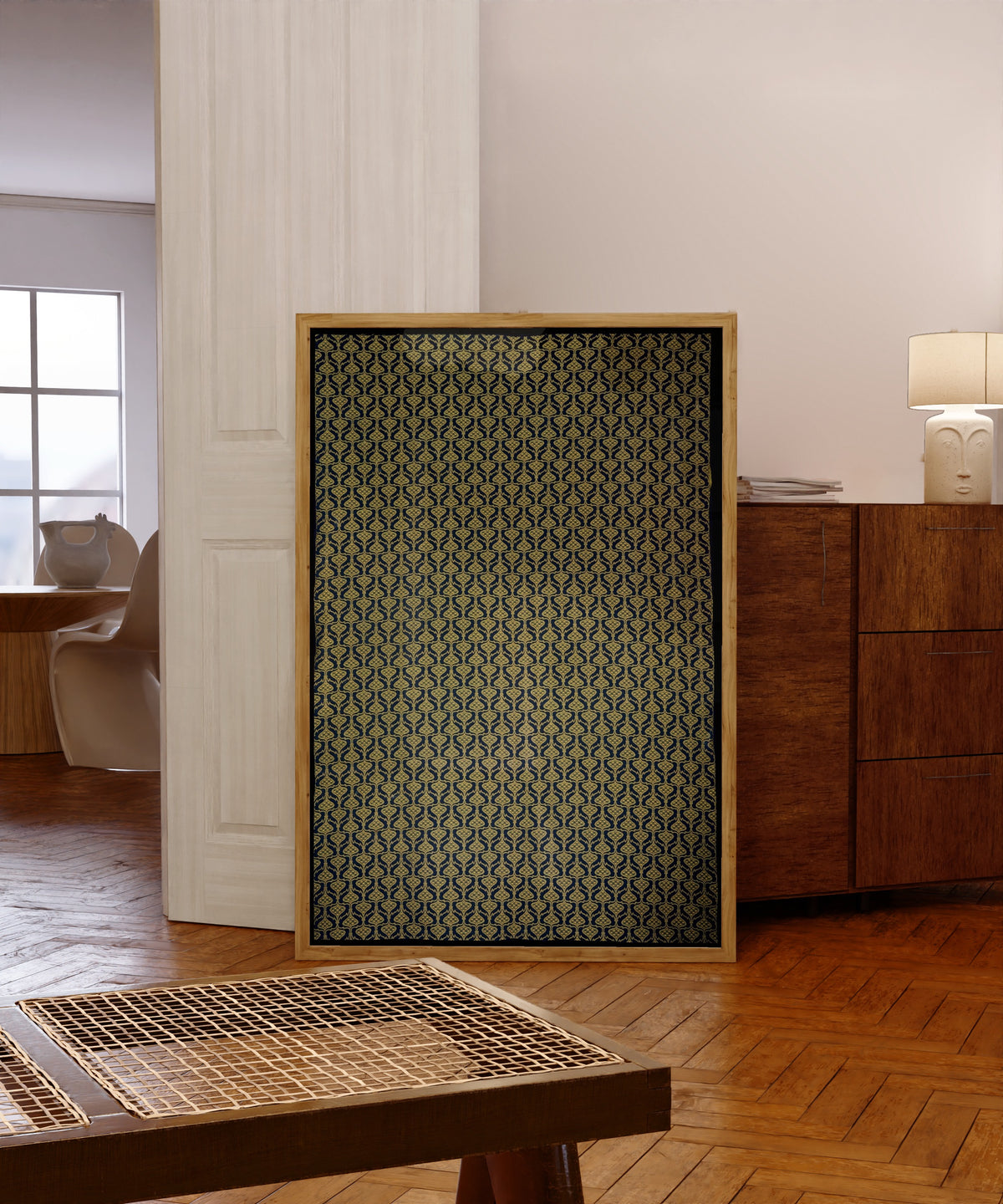Framed art print of Wallpaper Design by Arthur Heygate Mackmurdo, in a light wood frame leaning in a warm room with a parquet floor