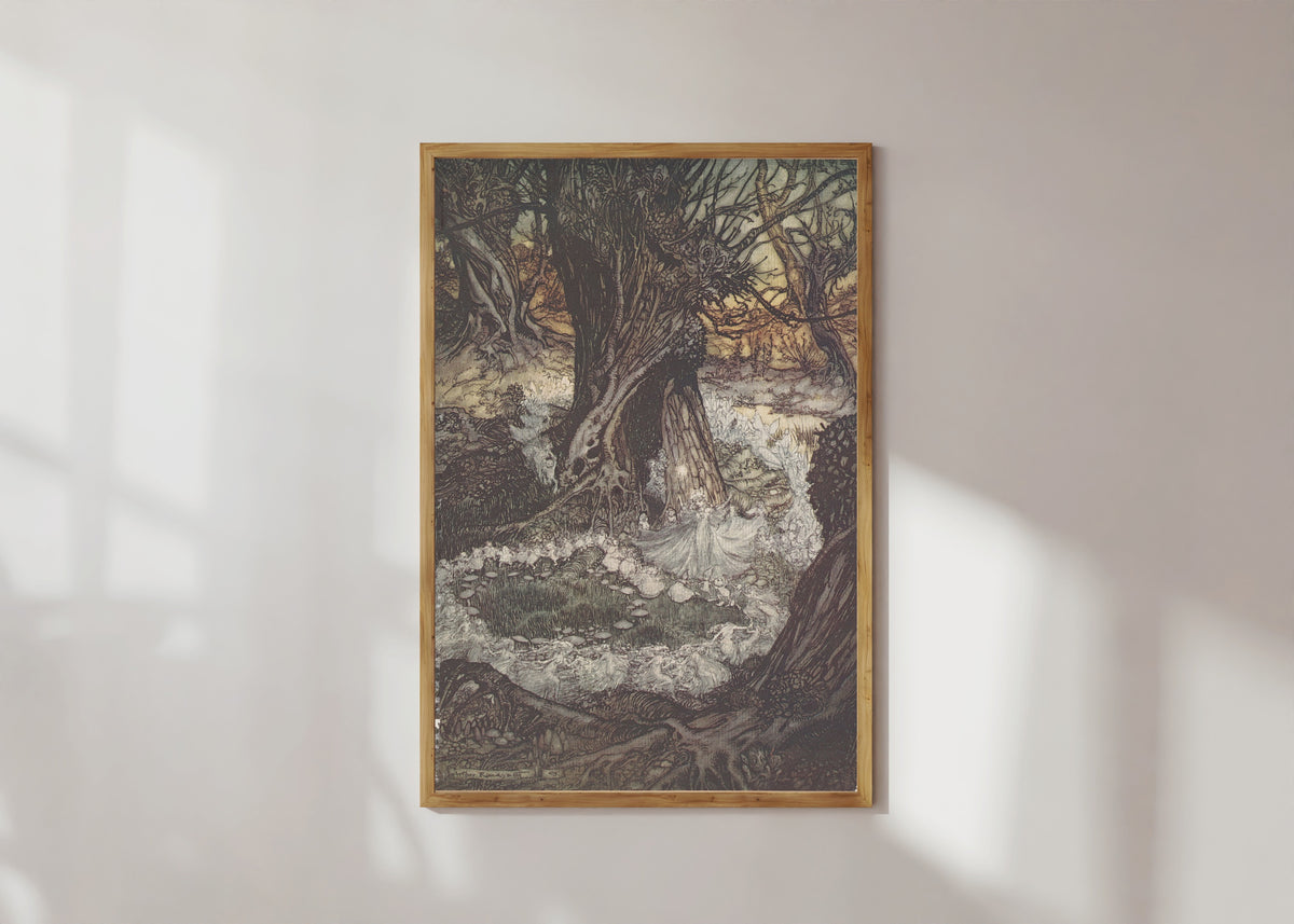 Framed art print of Come, Now a Roundel by Arthur Rackham, in a light wood frame on a sunlit white wall