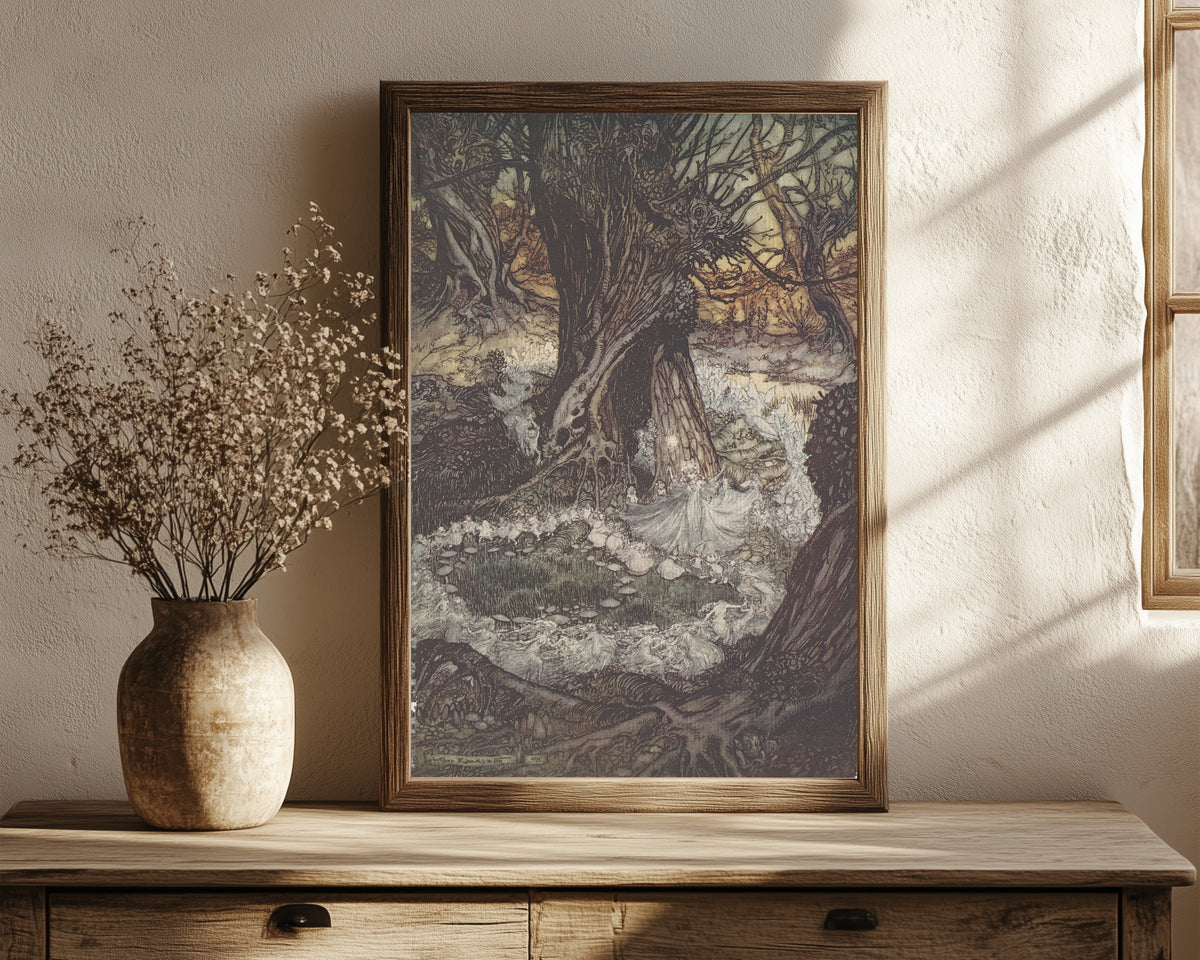 Framed art print of Come, Now a Roundel by Arthur Rackham, in a dark wood frame leaning on a rustic console beside dried flowers