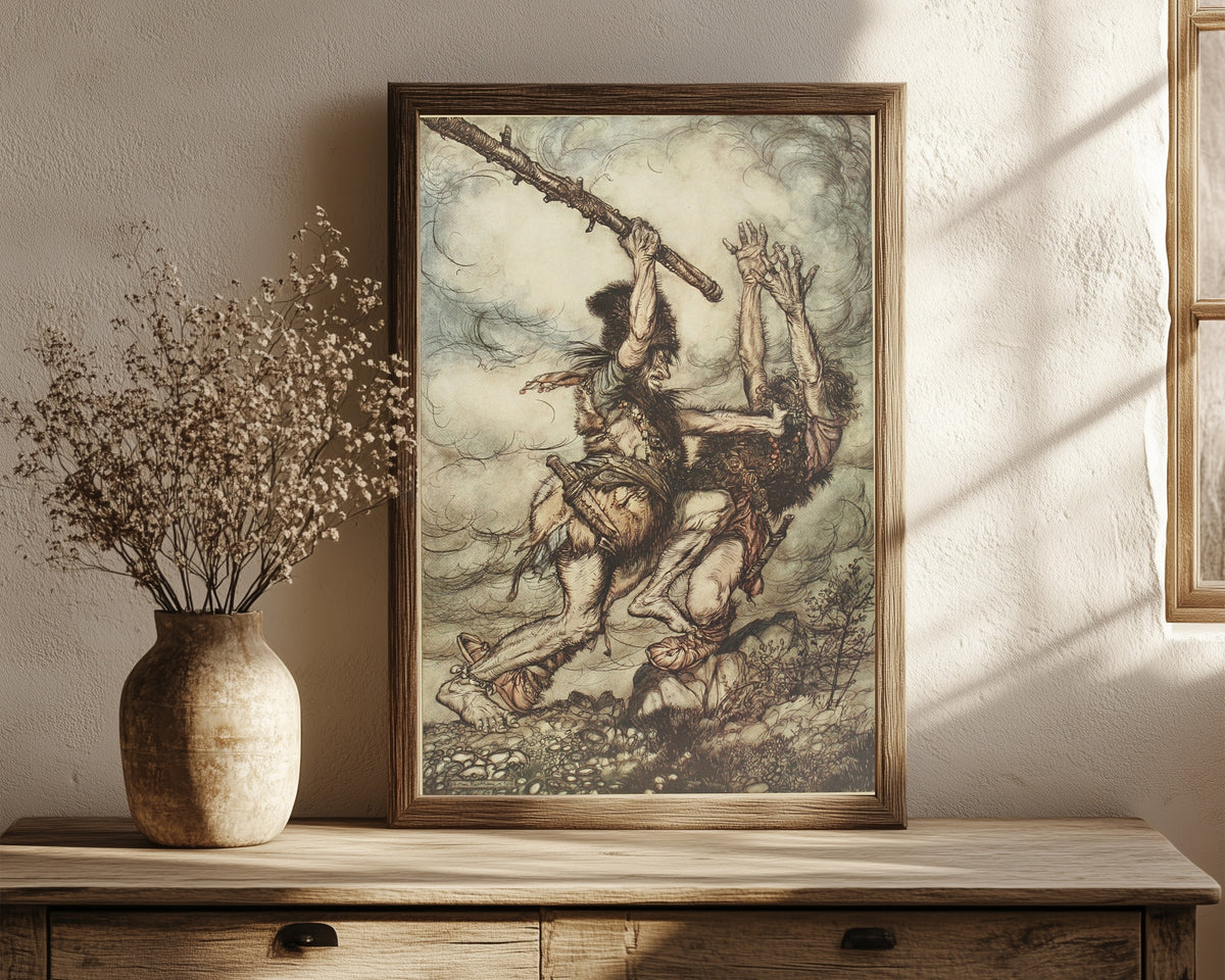 Framed art print of Fafner Kills Fasolt by Arthur Rackham, in a dark wood frame leaning on a rustic console beside dried flowers
