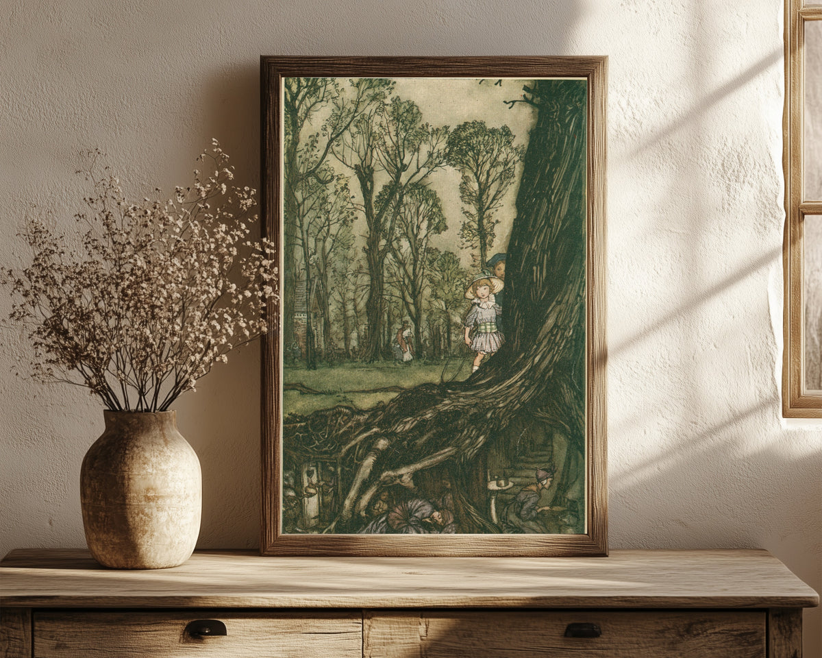 Framed art print of Fairies Are All More or Less in Hiding Until Dusk by Arthur Rackham, in a dark wood frame leaning on a rustic console beside dried flowers
