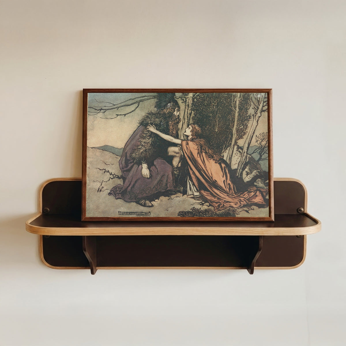 Framed art print of Father! Father! Tell Me What Ails Thee? by Arthur Rackham, in a dark wood frame resting on a wall shelf
