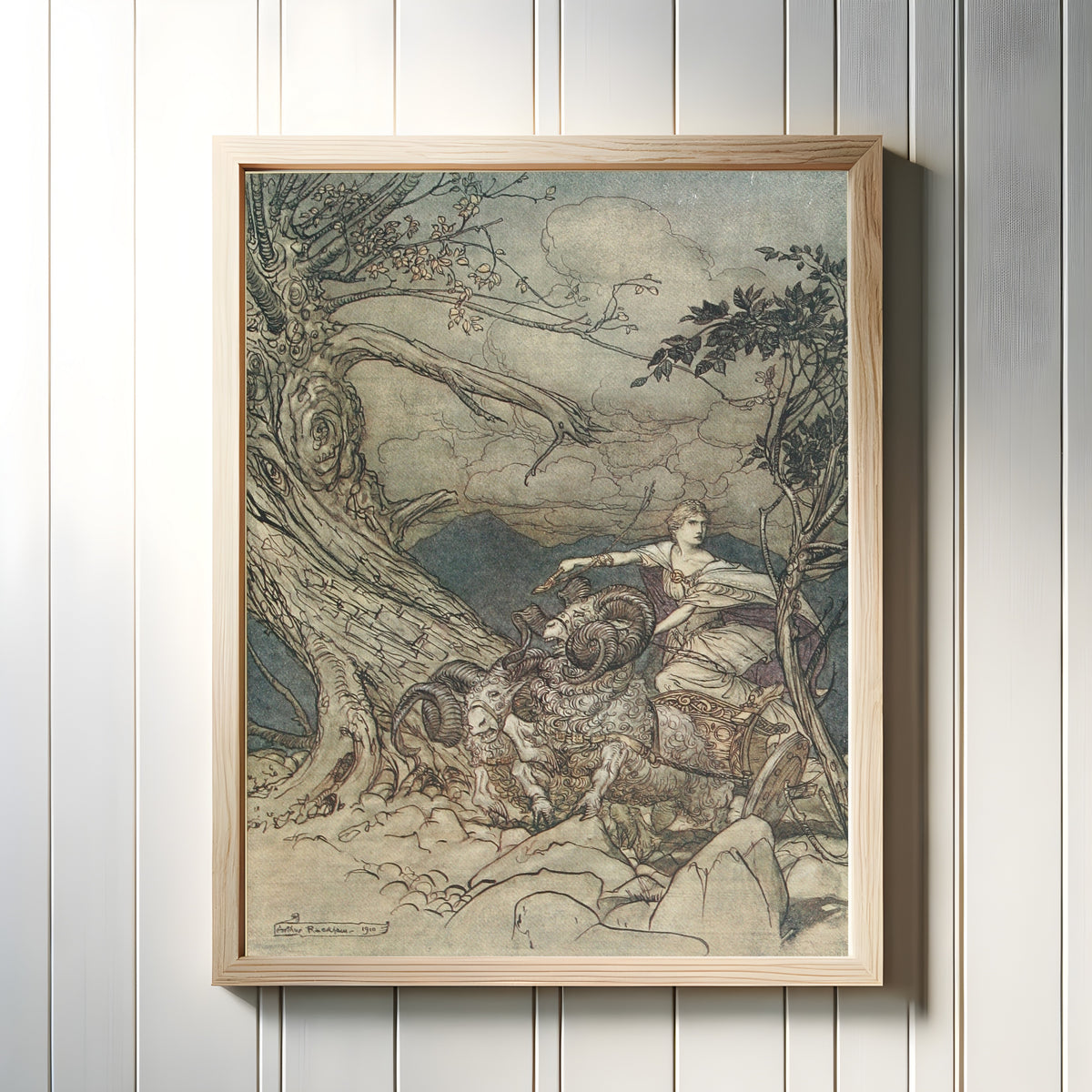Framed art print of Fricka Approaches in Anger by Arthur Rackham, in a light wood frame on a white panelled wall
