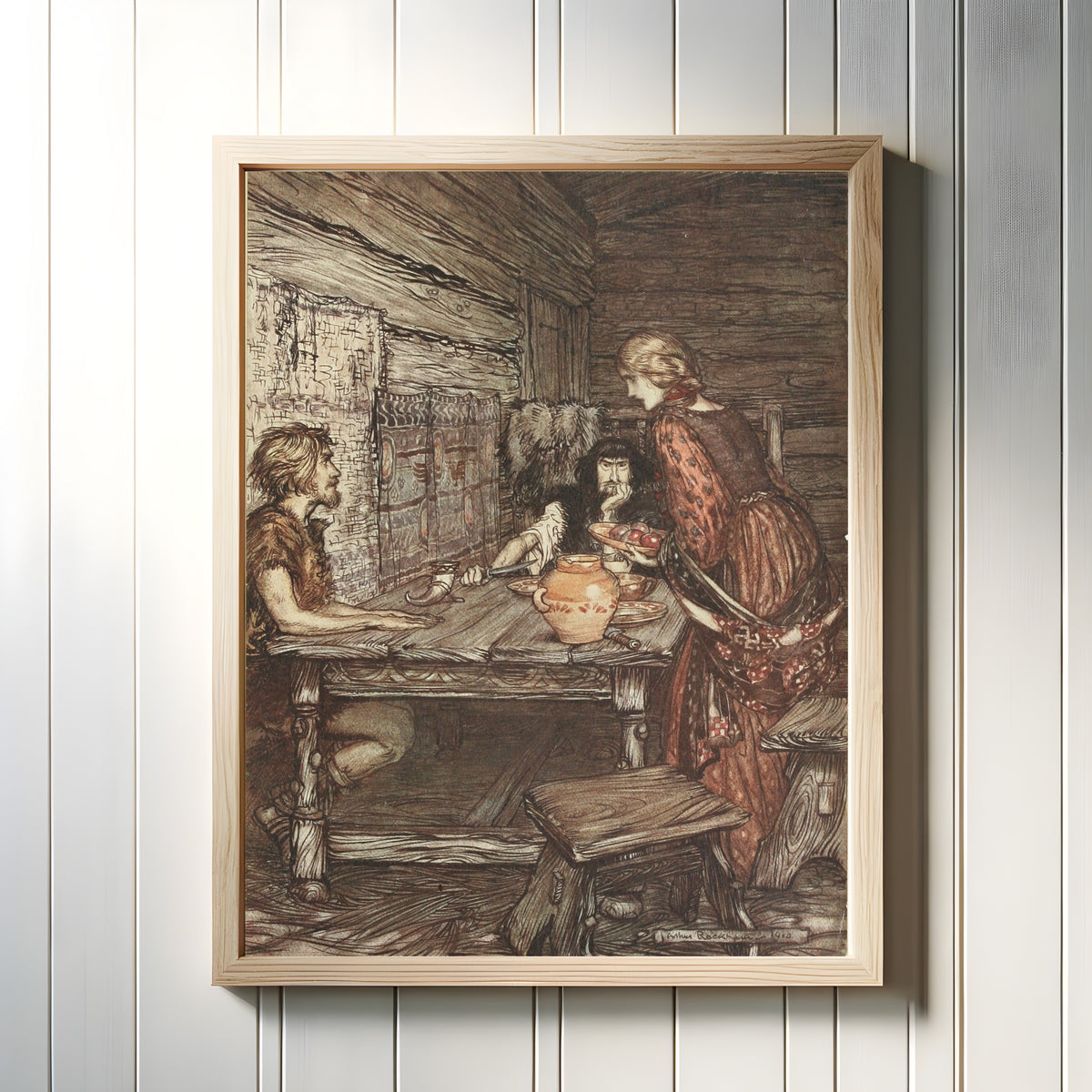Framed art print of Hunding Discovers the Likeness Between Siegmund and Sieglinde by Arthur Rackham, in a light wood frame on a white panelled wall