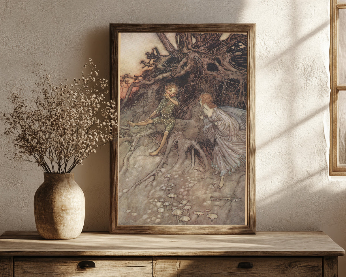 Framed art print of I Am That Merry Wanderer of the Night by Arthur Rackham, in a dark wood frame leaning on a rustic console beside dried flowers