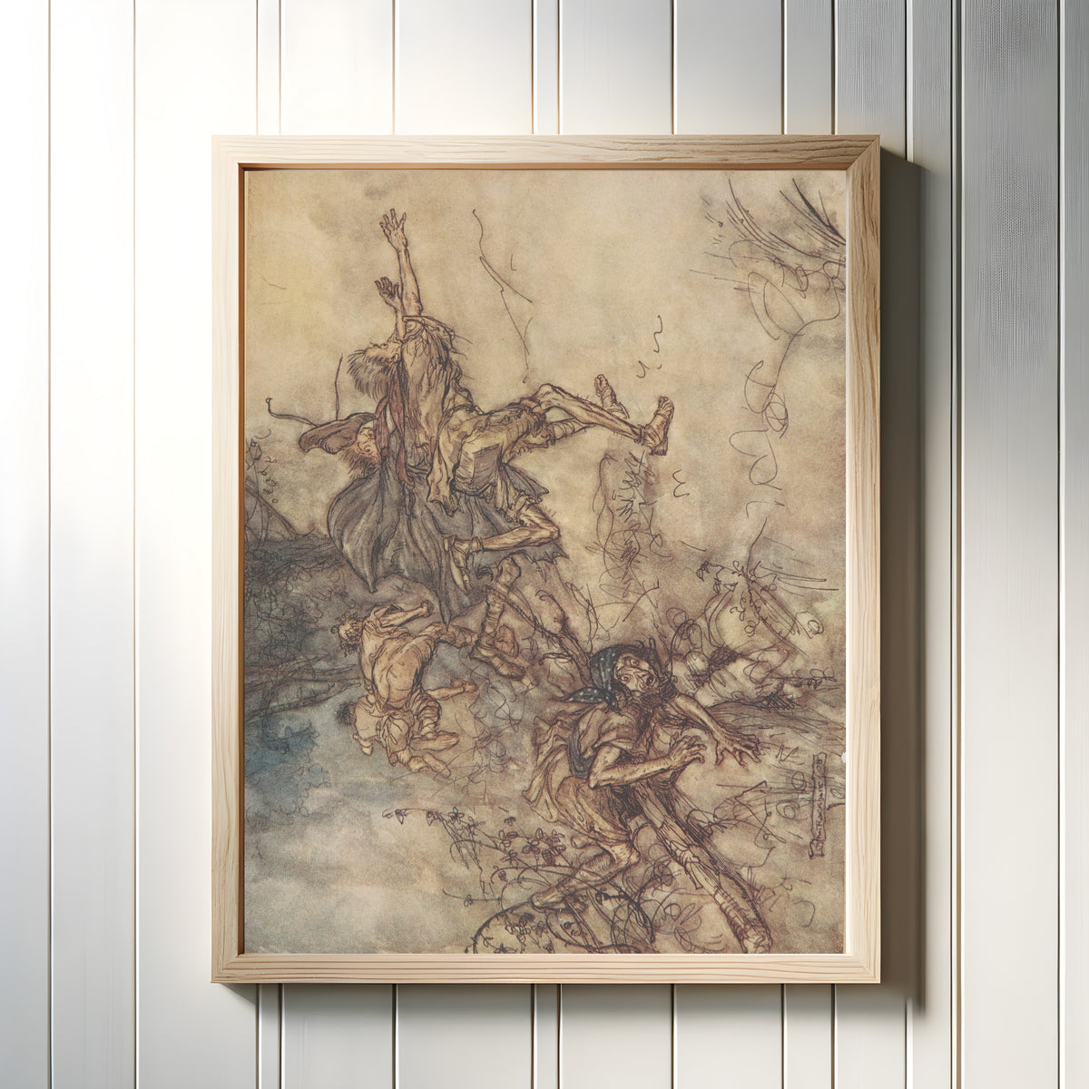 Framed art print of O Monstrous! O Strange! We Are Haunted by Arthur Rackham, in a light wood frame on a white panelled wall