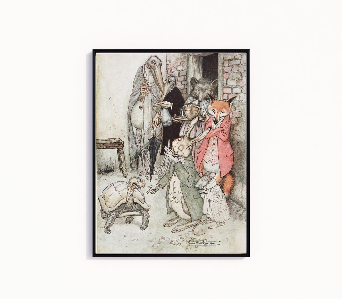 Framed art print of The Hare and the Tortoise by Arthur Rackham, in a slim black frame on a plain white wall