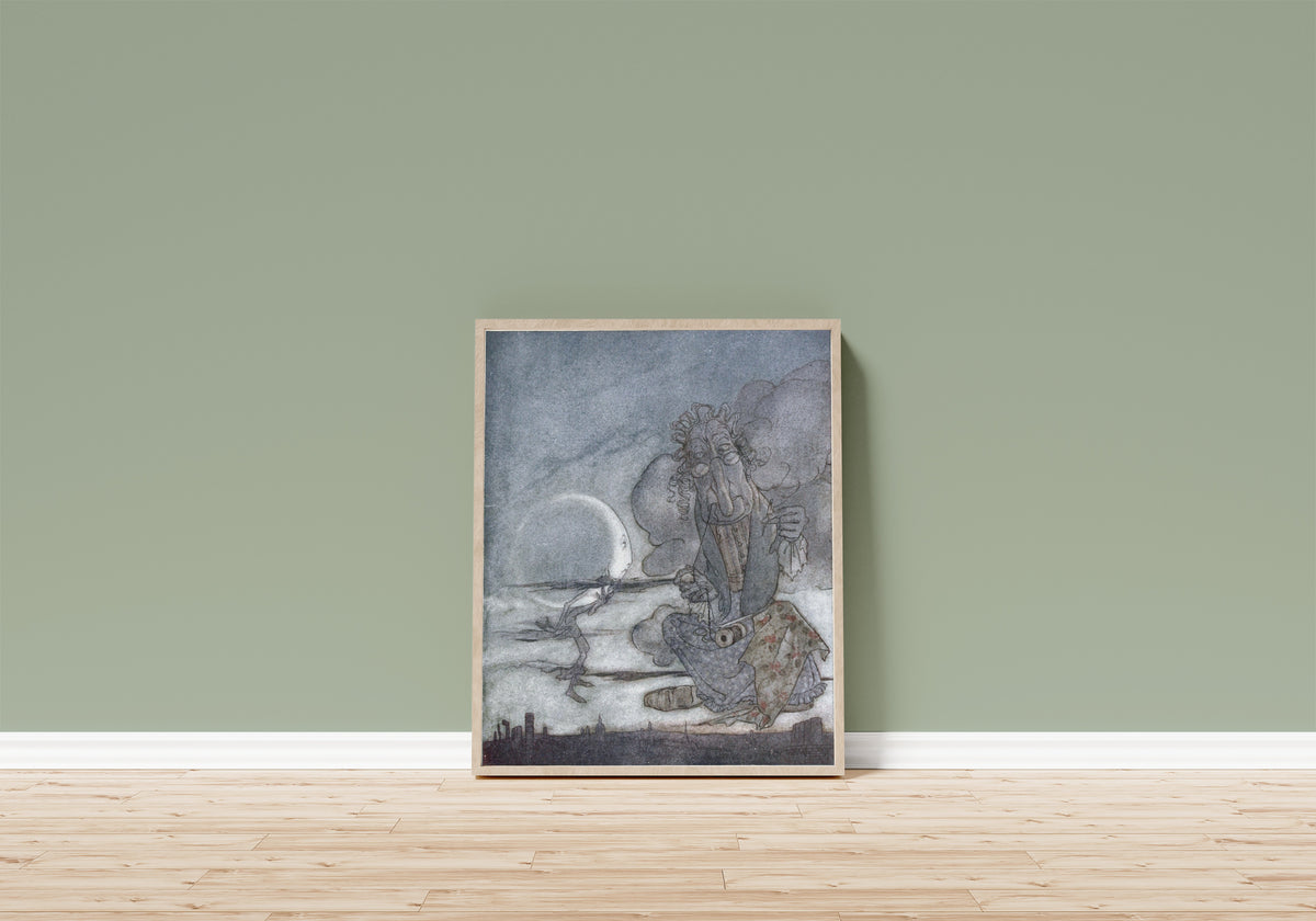Framed art print of The Moon and Her Mother by Arthur Rackham, in a light wood frame leaning on a sage green wall above a wooden floor
