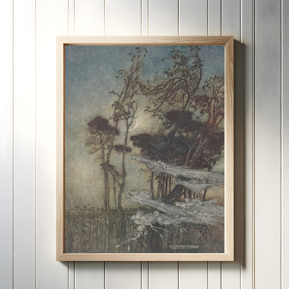 Framed art print of The Moon, Like to a Silver Bow New-Bent in Heaven by Arthur Rackham, in a light wood frame on a white panelled wall
