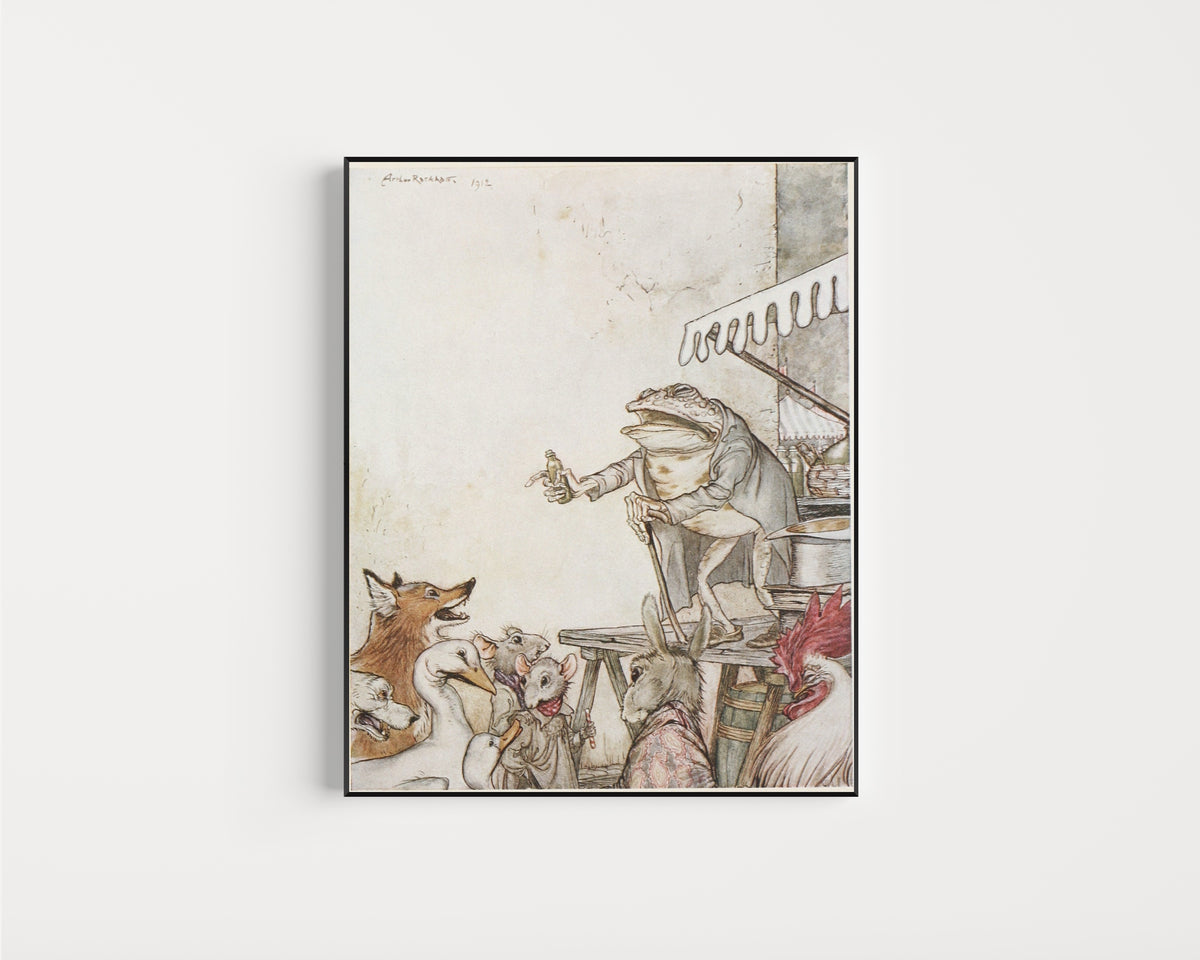 Framed art print of The Quack Frog by Arthur Rackham, in a slim black frame on a plain white wall