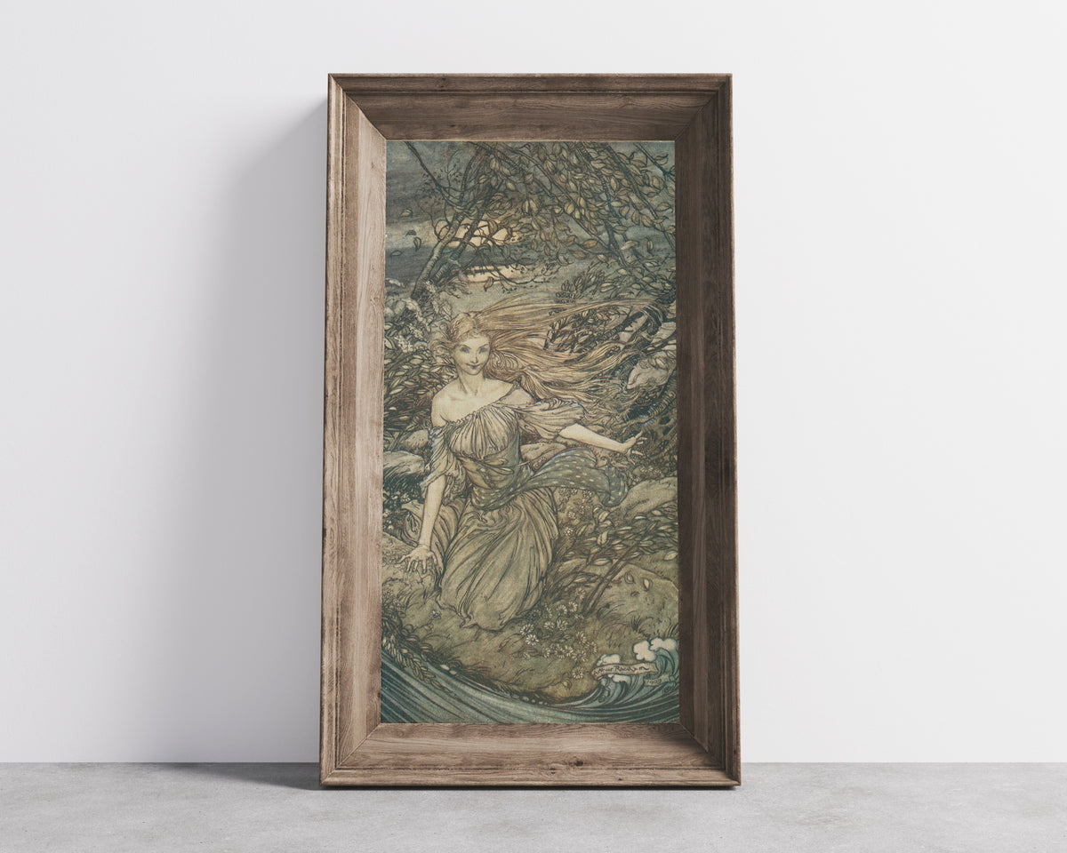 Framed art print of There Under the Branches of the Overhanging Trees Was Undine by Arthur Rackham, in a wide wooden frame leaning against a concrete wall