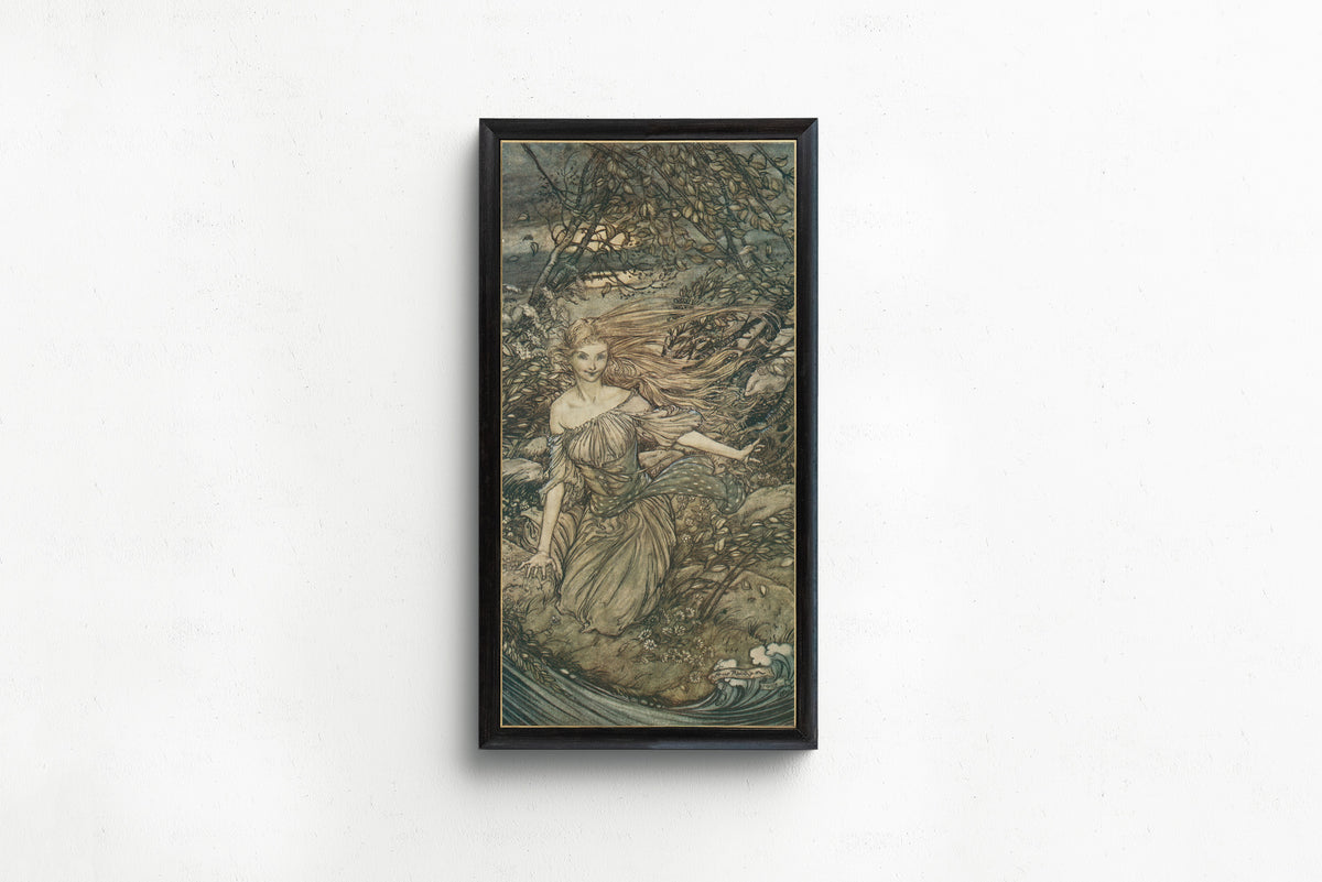 Framed art print of There Under the Branches of the Overhanging Trees Was Undine by Arthur Rackham, in a slim black frame on a plain white wall