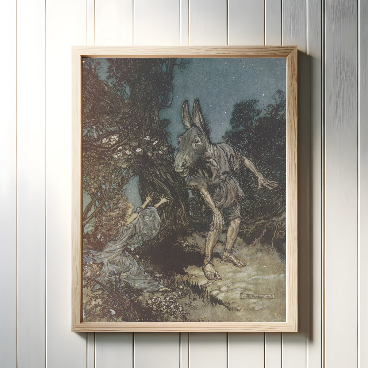 Framed art print of What Angel Wakes Me from My Flowery Bed? by Arthur Rackham, in a light wood frame on a white panelled wall