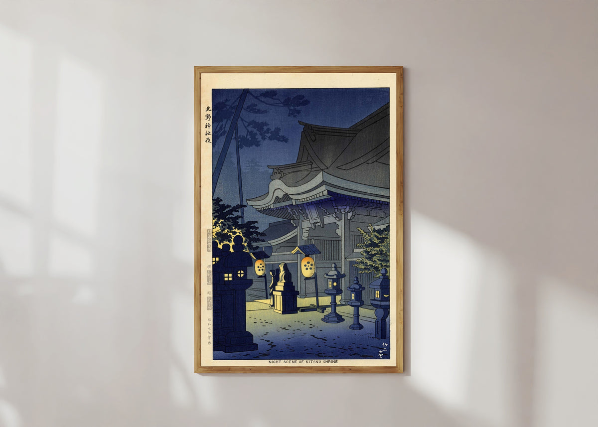 Framed art print of Night Scene of Kitano Shrine by Asano Takeji, in a light wood frame on a sunlit white wall