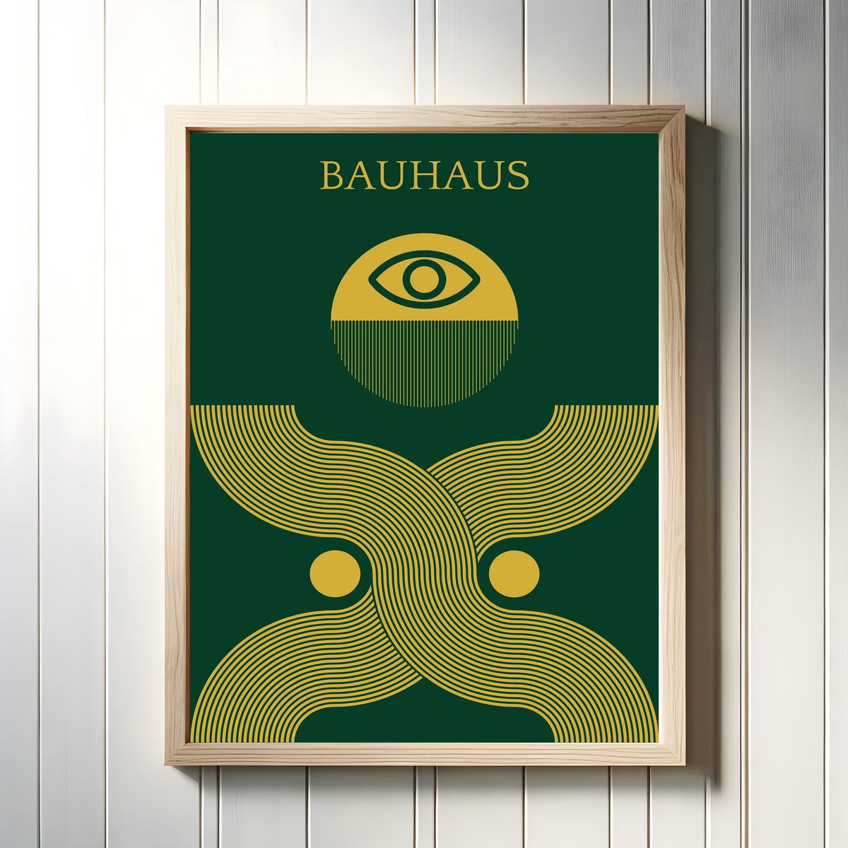Framed art print of Deus Ex by Bauhaus, in a light wood frame on a white panelled wall