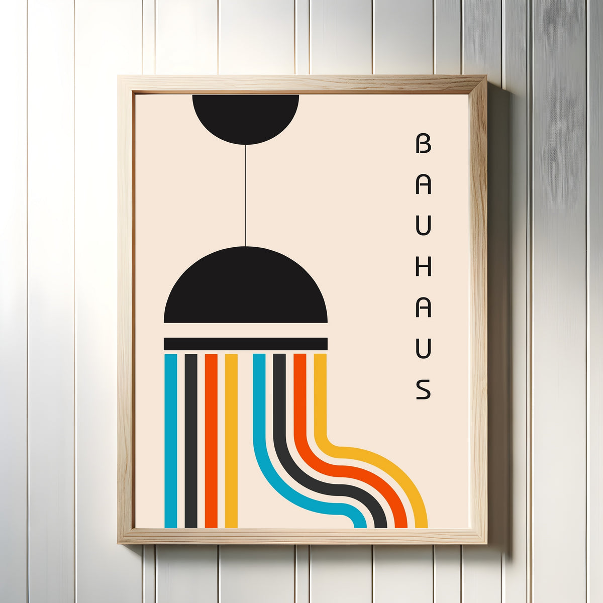 Framed art print of The Lamp by Bauhaus, in a light wood frame on a white panelled wall