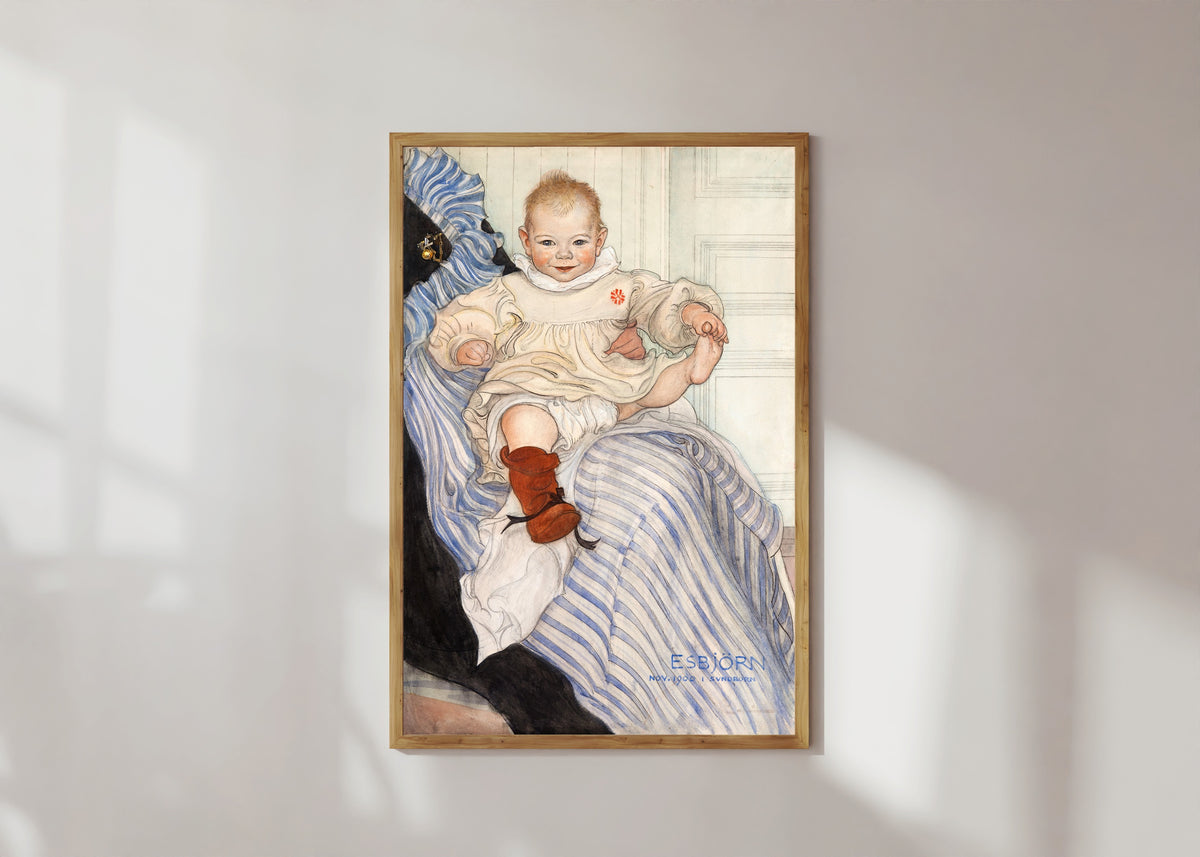 Framed art print of Esbjörn by Carl Larsson, in a light wood frame on a sunlit white wall