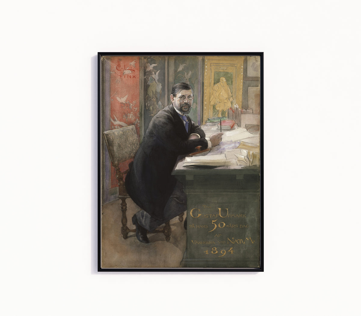 Framed art print of Gustaf Upmark, director of the Nationalmuseum by Carl Larsson, in a slim black frame on a plain white wall