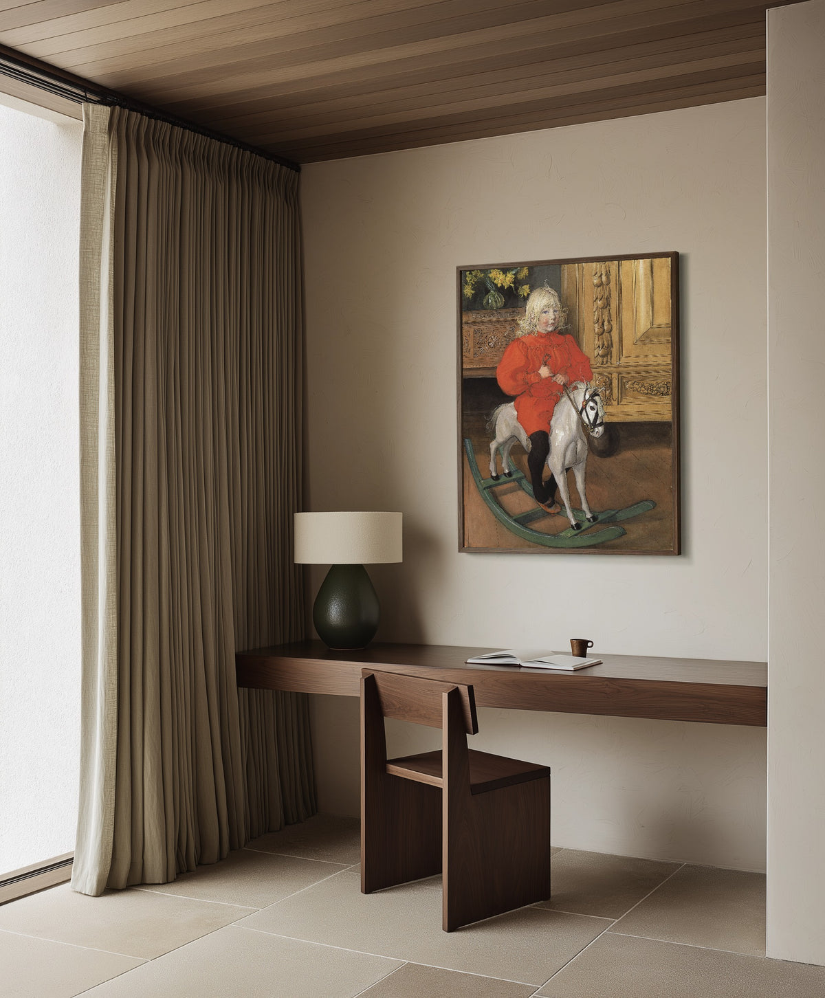 Framed art print of Murre: Portrait of Casimir Laurin by Carl Larsson, in a dark wood frame on a plaster wall above a walnut desk