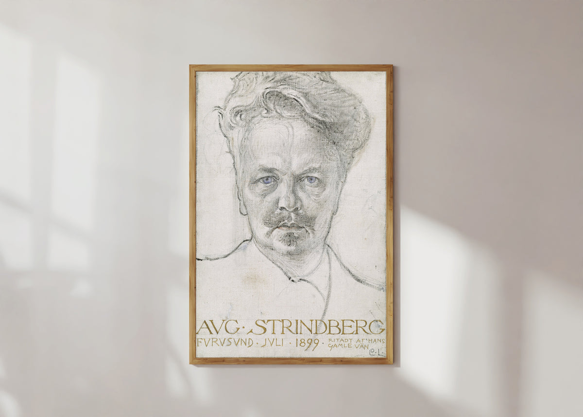 Framed art print of The Author August Strindberg by Carl Larsson, in a light wood frame on a sunlit white wall