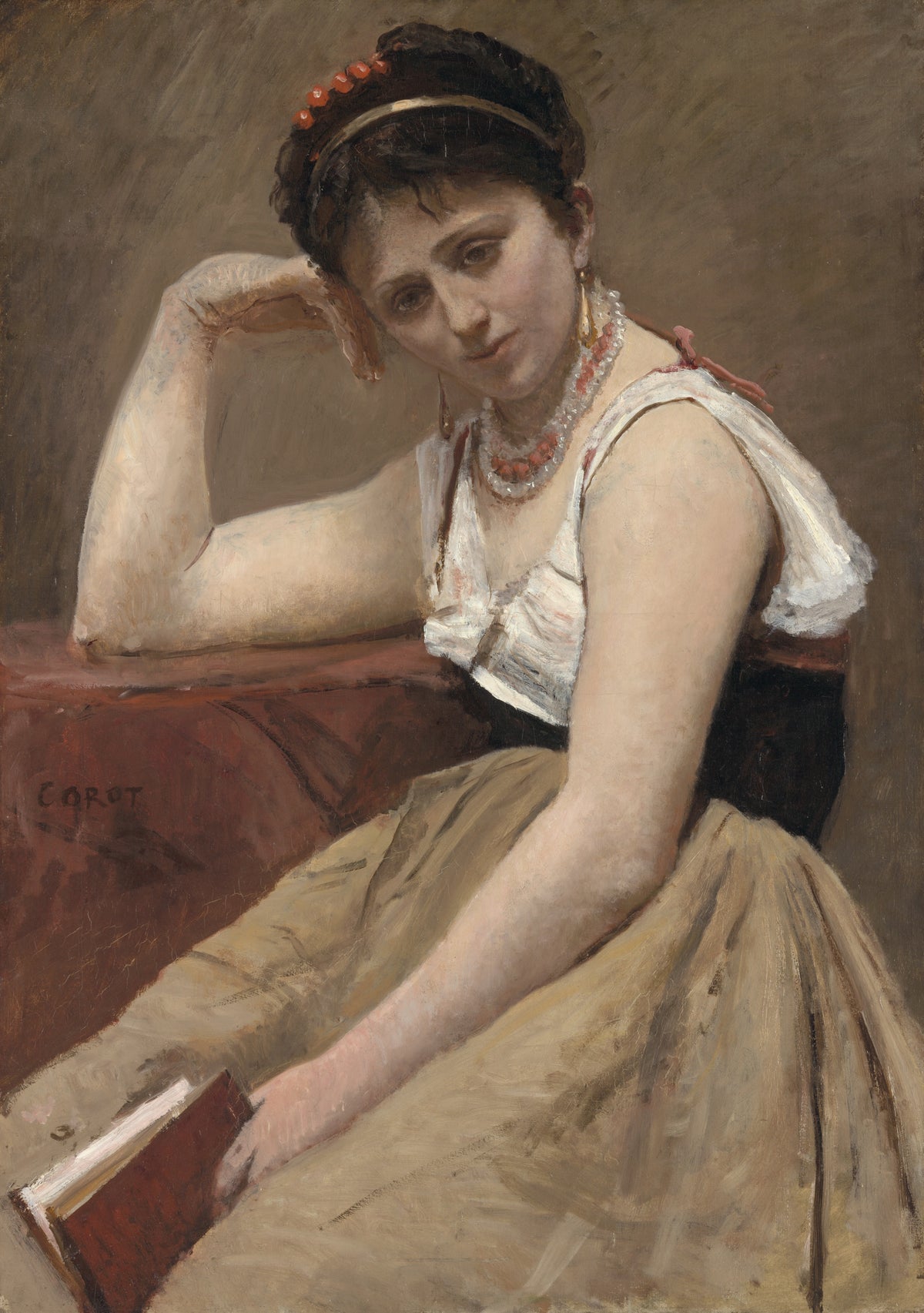 Interrupted Reading by Jean-Baptiste-Camille Corot — A seated woman looks up from her open book
