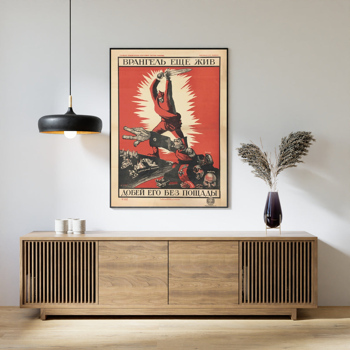 Framed art print of Finish Him Off Without Mercy! by Dmitry Moor, above a slatted wood sideboard