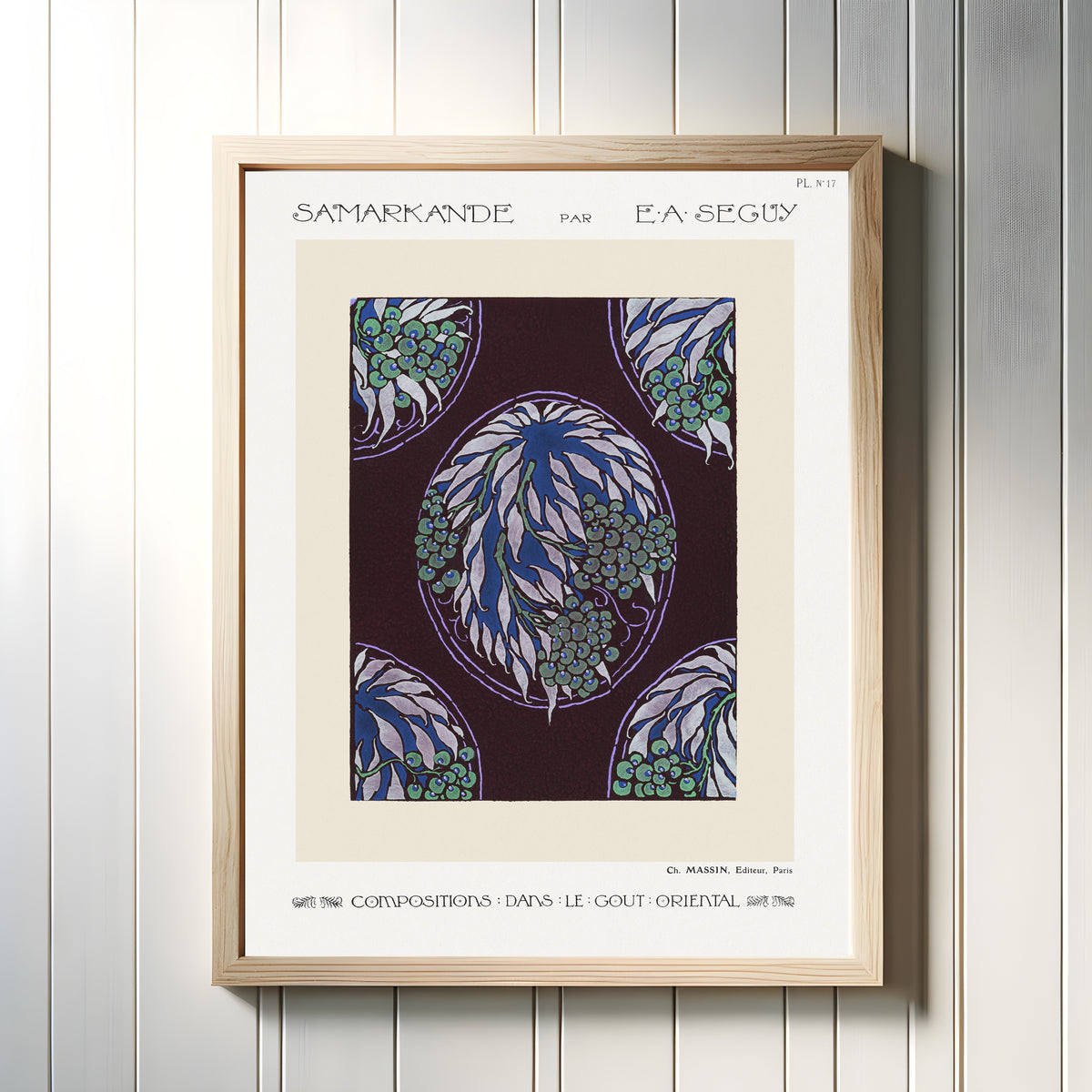 Framed art print of Samarkande, Plate 17 by E. A. Séguy, in a light wood frame on a white panelled wall