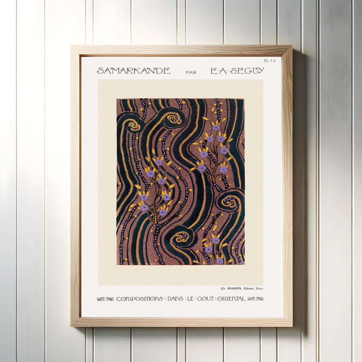 Framed art print of Samarkande, Plate 8 by E. A. Séguy, in a light wood frame on a white panelled wall