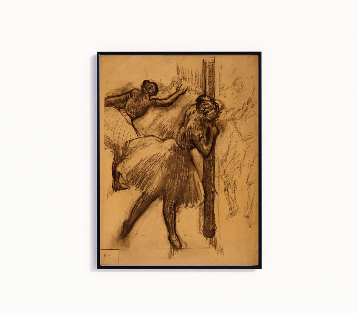 Framed art print of Danseuse, appuyée à une colonne by Edgar Degas, in a slim black frame on a plain white wall