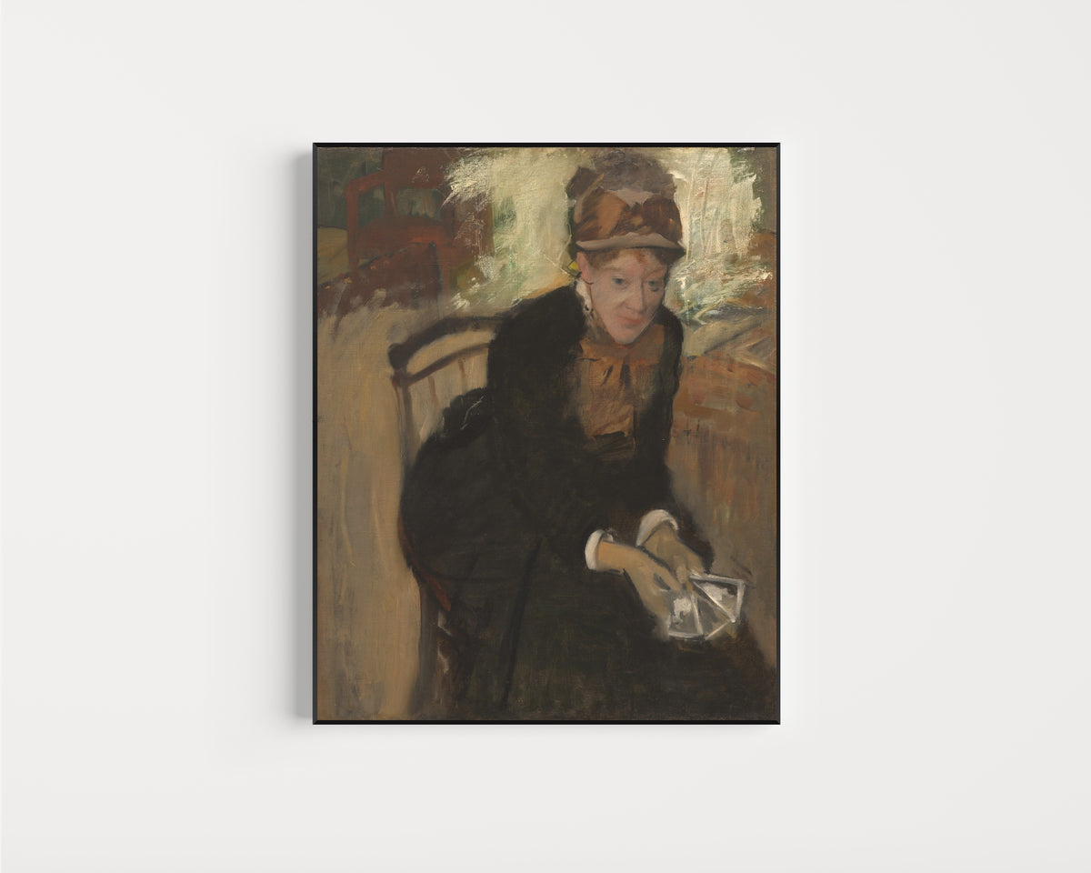 Framed art print of Mary Cassatt by Edgar Degas, in a slim black frame on a plain white wall