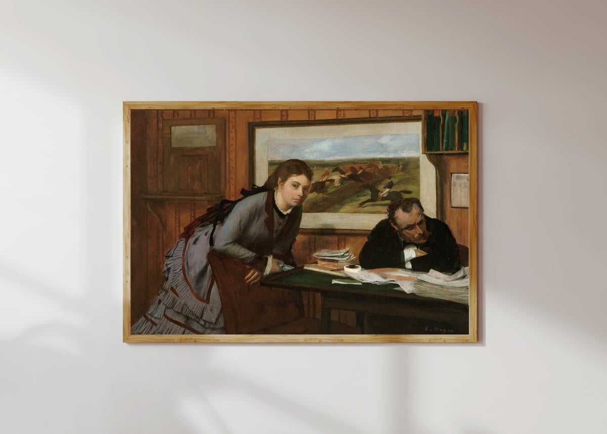 Framed art print of Sulking by Edgar Degas, in a light wood frame on a sunlit white wall