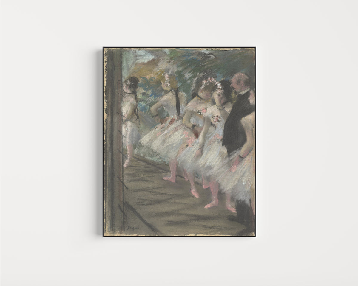 Framed art print of The Ballet by Edgar Degas, in a slim black frame on a plain white wall
