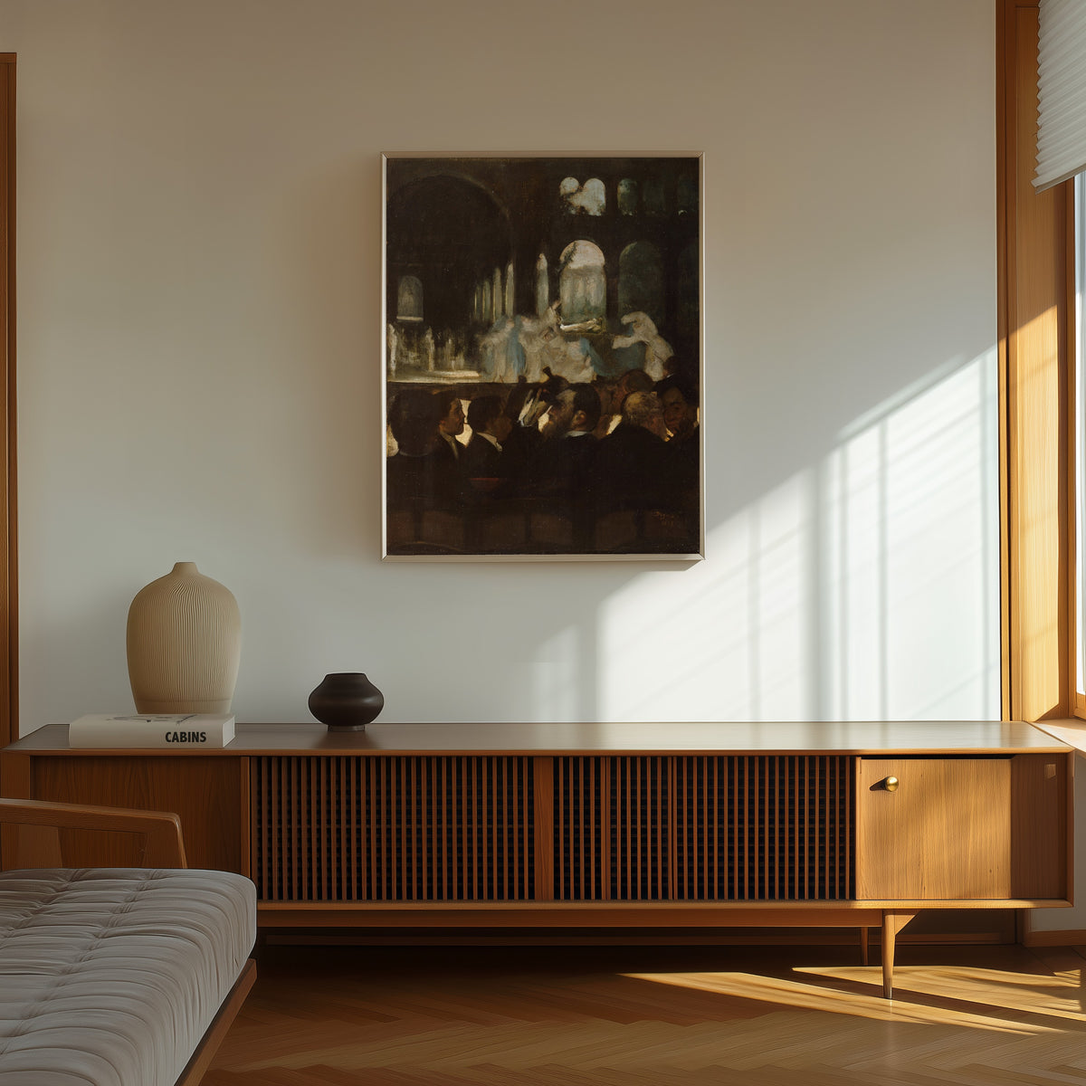 Framed art print of The Ballet from Robert le Diable by Edgar Degas, in a thin light frame on a sunlit wall above a wooden sideboard