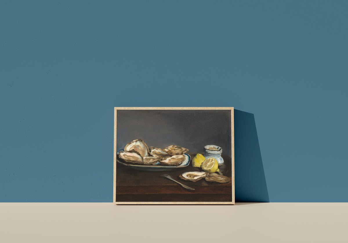 Framed art print of Oysters by Édouard Manet, in a light wood frame leaning on a blue wall