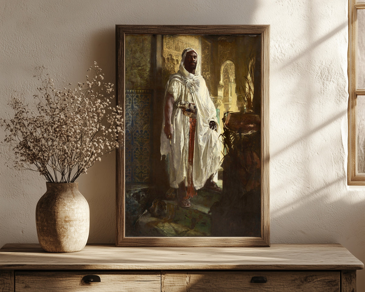 Framed art print of The Moorish Chief by Eduard Charlemont, in a dark wood frame leaning on a rustic console beside dried flowers