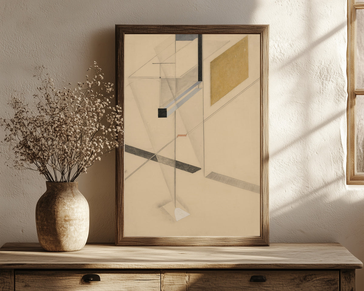 Framed art print of Proun Study l.n. 31 by El Lissitzky, in a dark wood frame leaning on a rustic console beside dried flowers